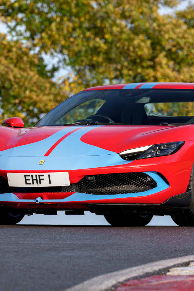 Красный спорткар Ferrari 296 GTB Assetto Fiorano