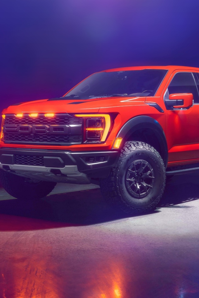 Красный пикап Ford F-150 Raptor