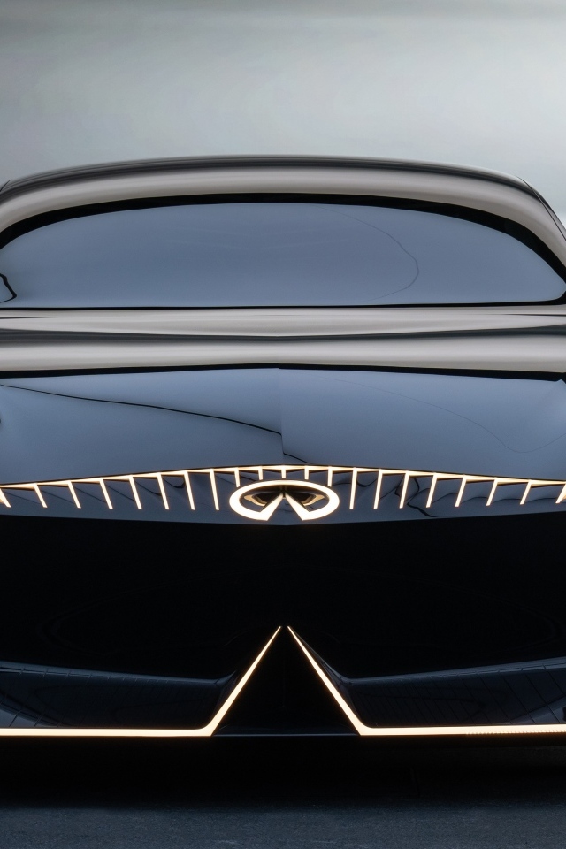 Красивый вид спереди на автомобиль Infiniti Vision Qe 2023 года