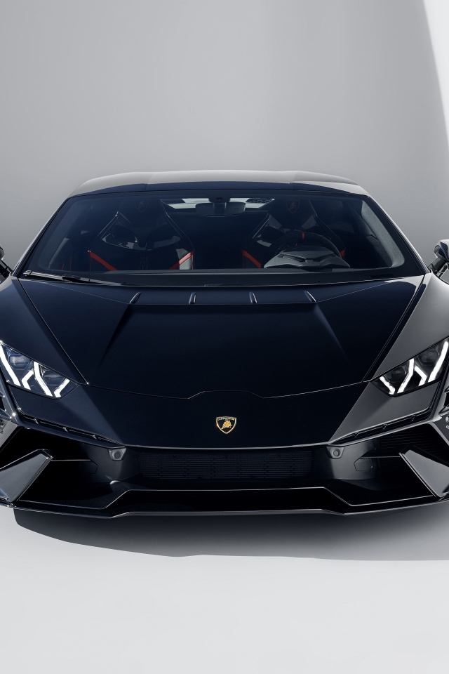 Черный автомобиль Lamborghini Huracán Tecnica 2023 года вид спереди
