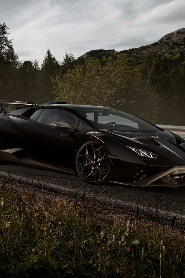 Черный быстрый автомобиль Lamborghini Huracán STO