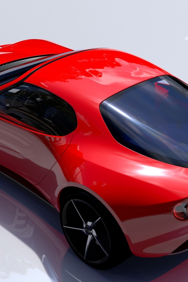 Вид сбоку на красный автомобиль Mazda Iconic SP