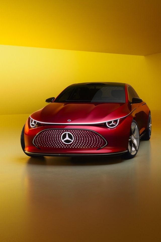 Красный автомобиль Mercedes-Benz Concept CLA Class 2024 года