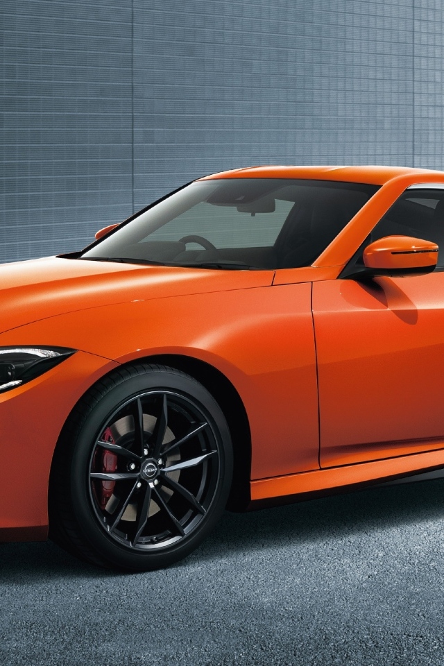 Оранжевый автомобиль Nissan Fairlady Z Version T