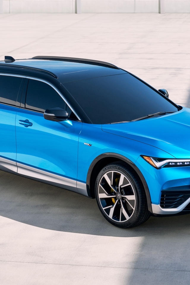 Голубой автомобиль Acura ZDX Type S 2024 года