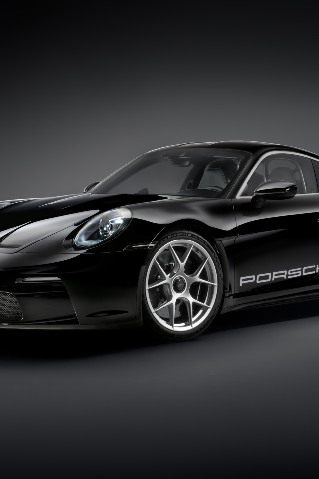 Черный автомобиль  Porsche 911 ST 2023 года