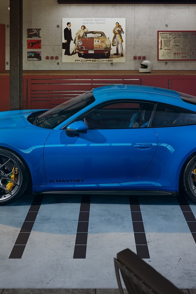 Синий автомобиль Porsche 911 GT3  вид сбоку