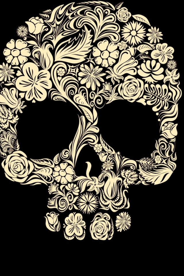 Череп из цветов на черном фоне