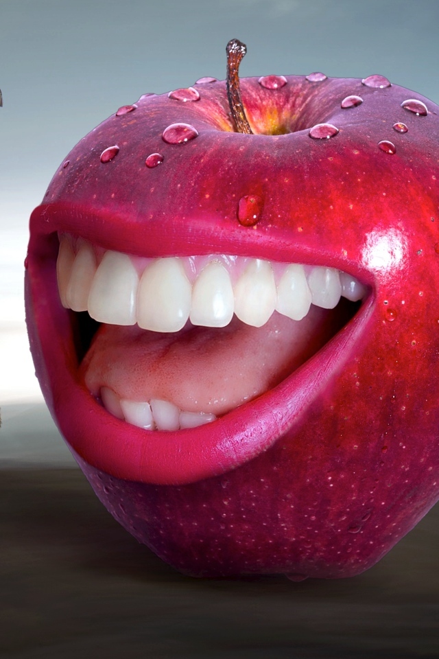 Красное яблоко с зубами