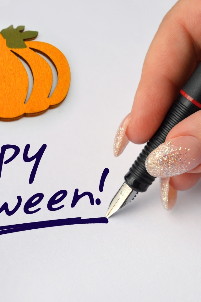 Ручка и надпись на Хэллоуин