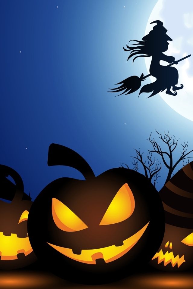 Тыквы и ведьма на праздник Хэллоуин