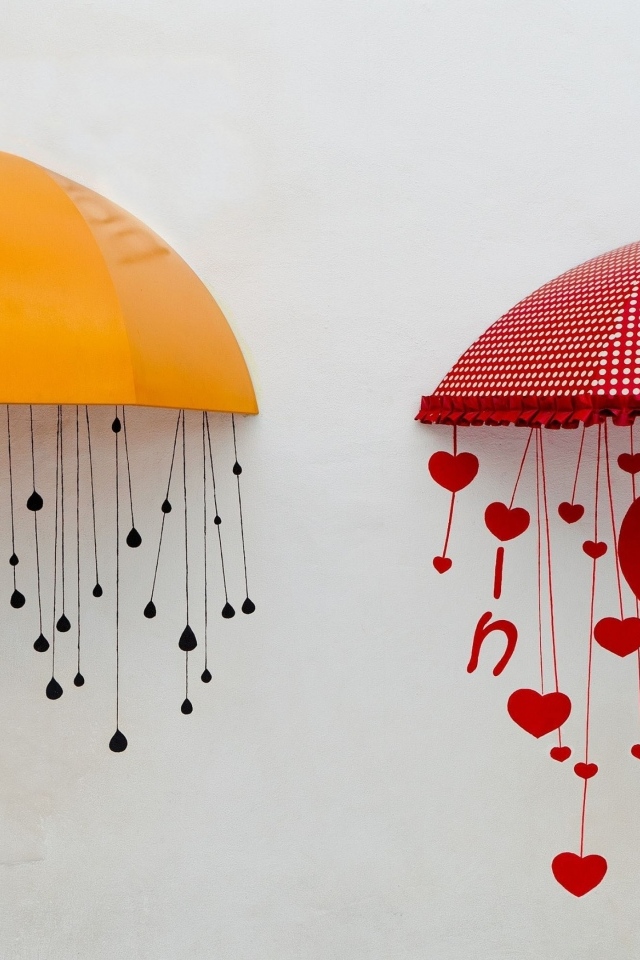 Два нарисованных зонта на серой поверхности