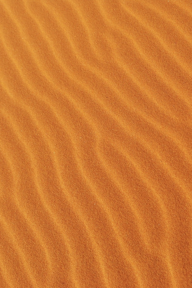 Волнистый горячий песок пустыни крупным планом