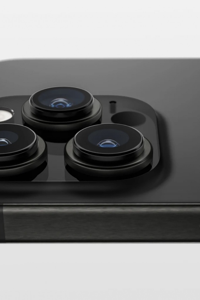 Черный iPhone 15 на сером фоне