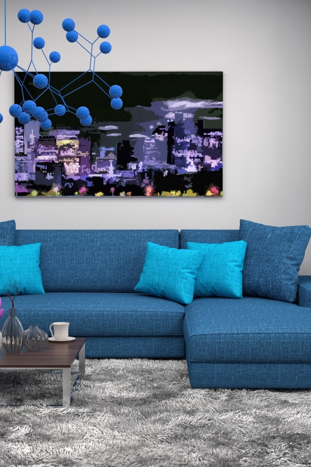 Большой синий диван в комнате в стиле модерн