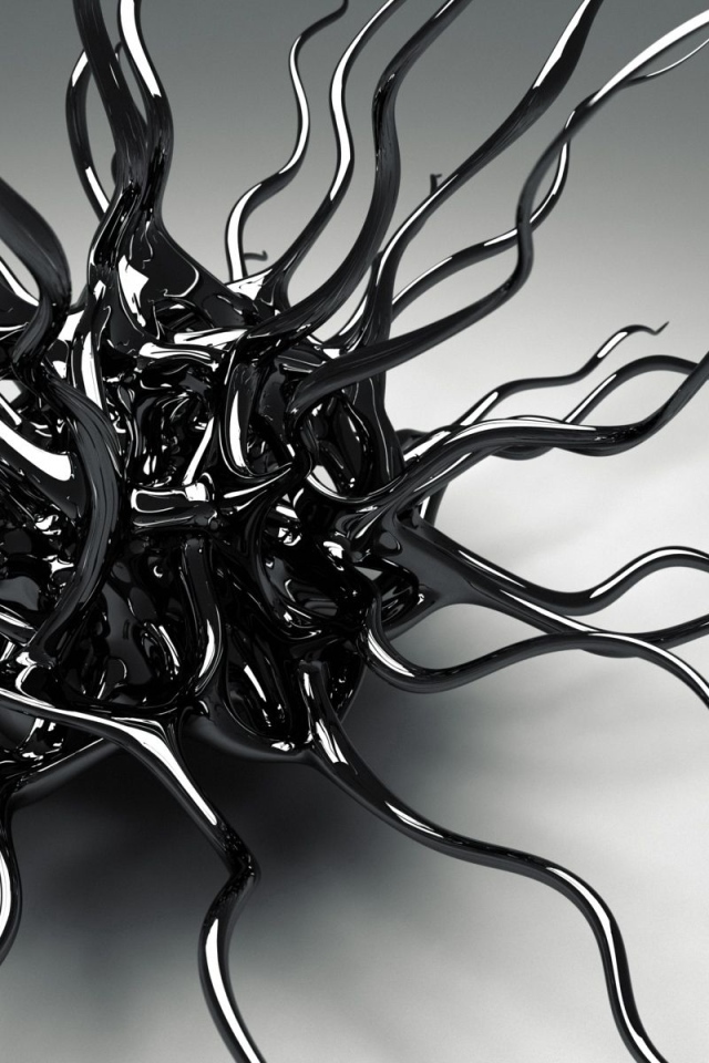 Черный металлический сплав на сером фоне