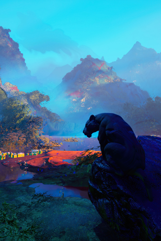 Большая черная пантера сидит на камне