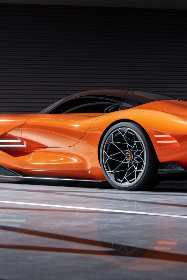 Вид сзади на оранжевый автомобиль концепт Genesis X Gran Berlinetta