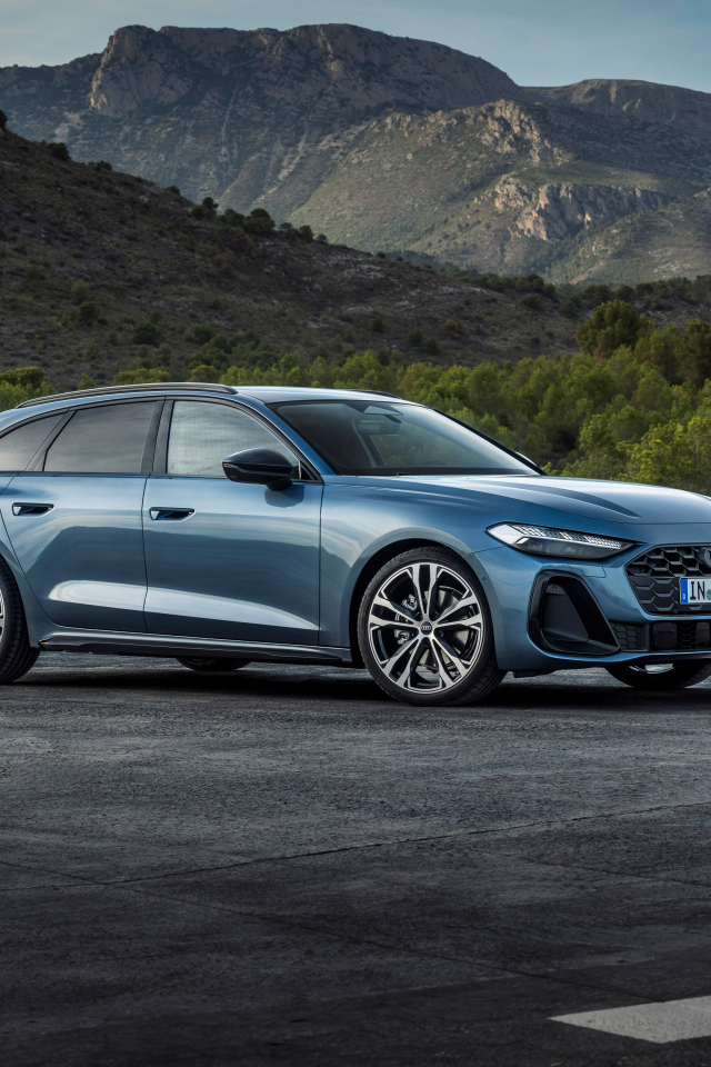 Синий автомобиль Audi A5 Avant TFSI quattro S line 2024 года на фоне гор