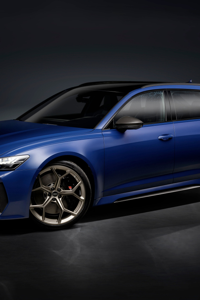 Синий автомобиль Audi RS 6 Avant Legacy 2024 года на сером фоне