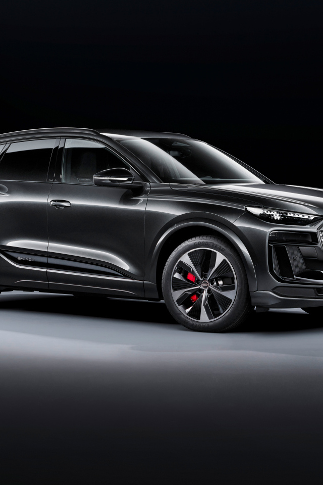 Презентация автомобиля  Audi SQ6 E-Tron 2024  года на черном фоне