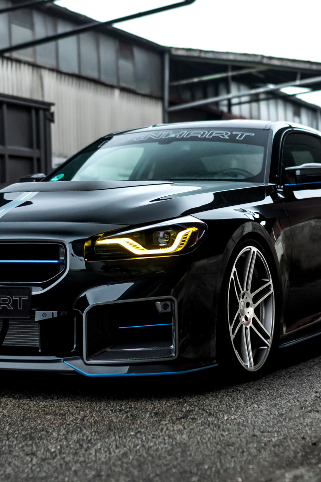 Черный автомобиль BMW M2 Manhart MH2 560