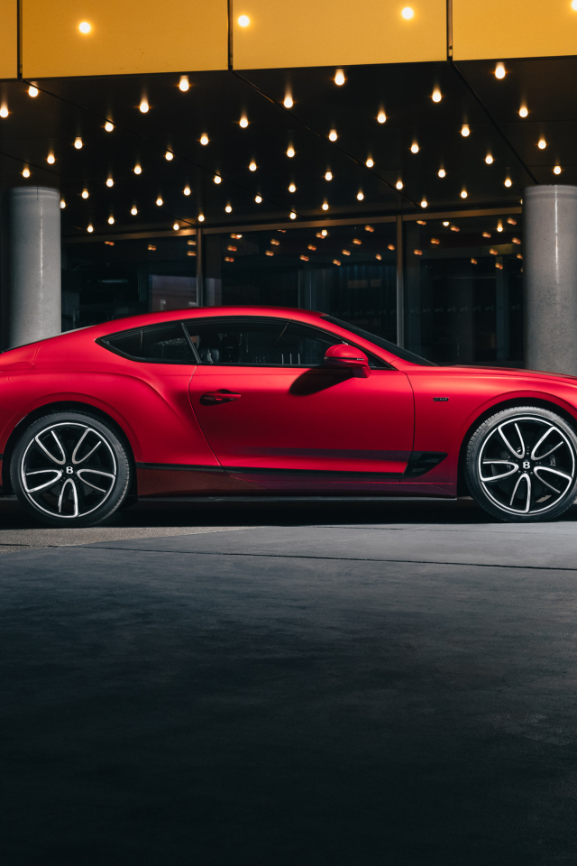 Вид сбоку на красный автомобиль Bentley Continental GT V8 Edition 2024 года