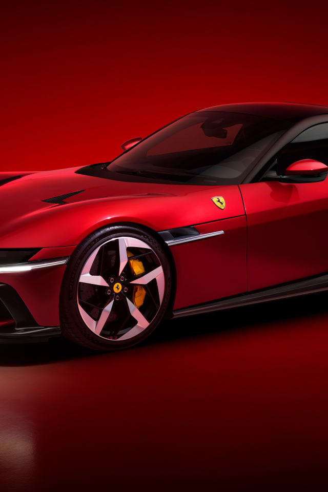 Автомобиль Ferrari 12Cilindri 2024 года на красном фоне
