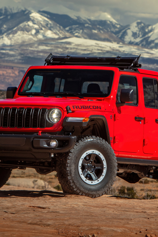 Красный внедорожник Jeep Gladiator Rubicon X With JPP Lift Kit 2024  года в горах