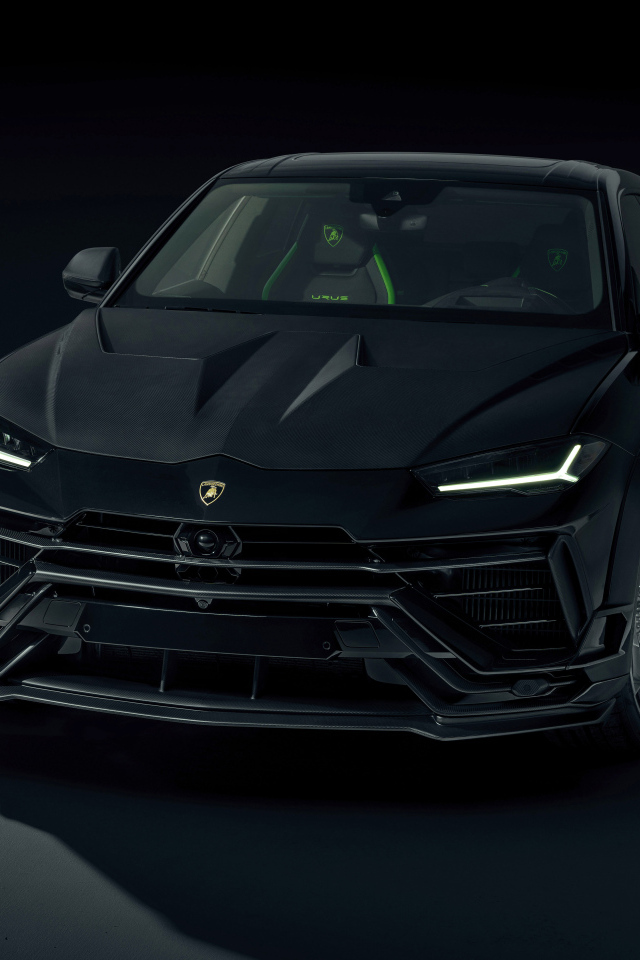 Автомобиль Lamborghini Urus на черном фоне
