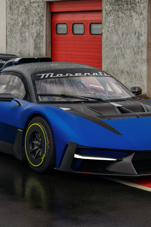 Синий быстрый автомобиль Maserati MCXtrema