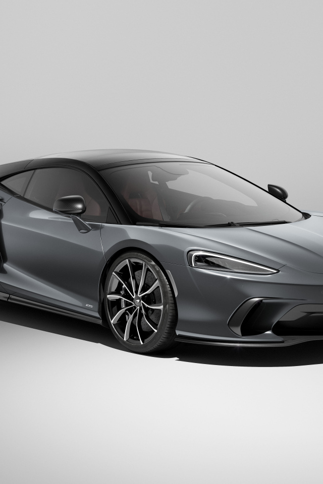 Серый автомобиль McLaren GTS