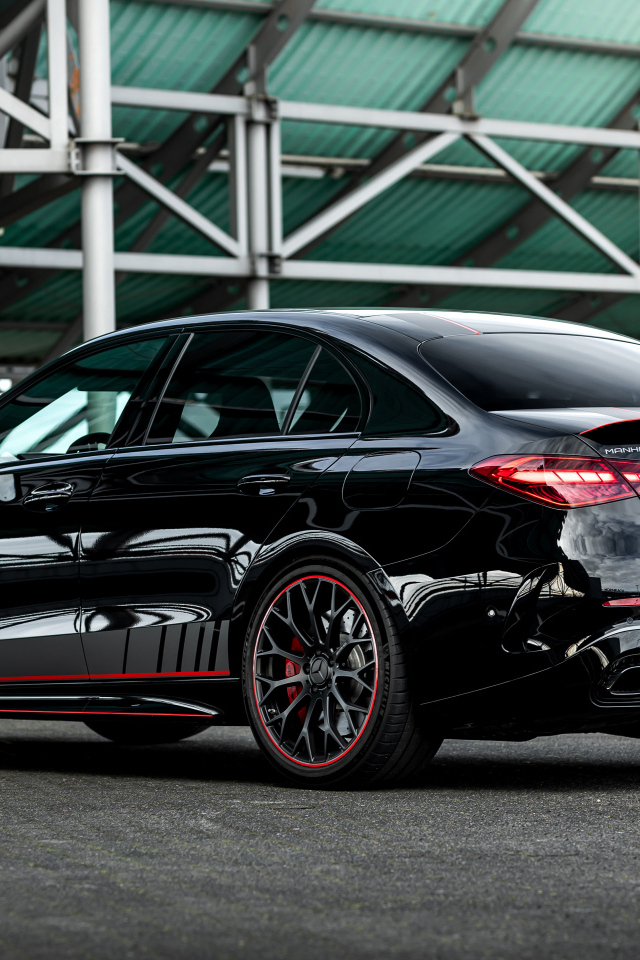 Черный автомобиль Manhart CRE 700 2024 года вид сзади