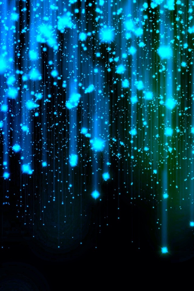 Яркие искры летят вниз на черном фоне