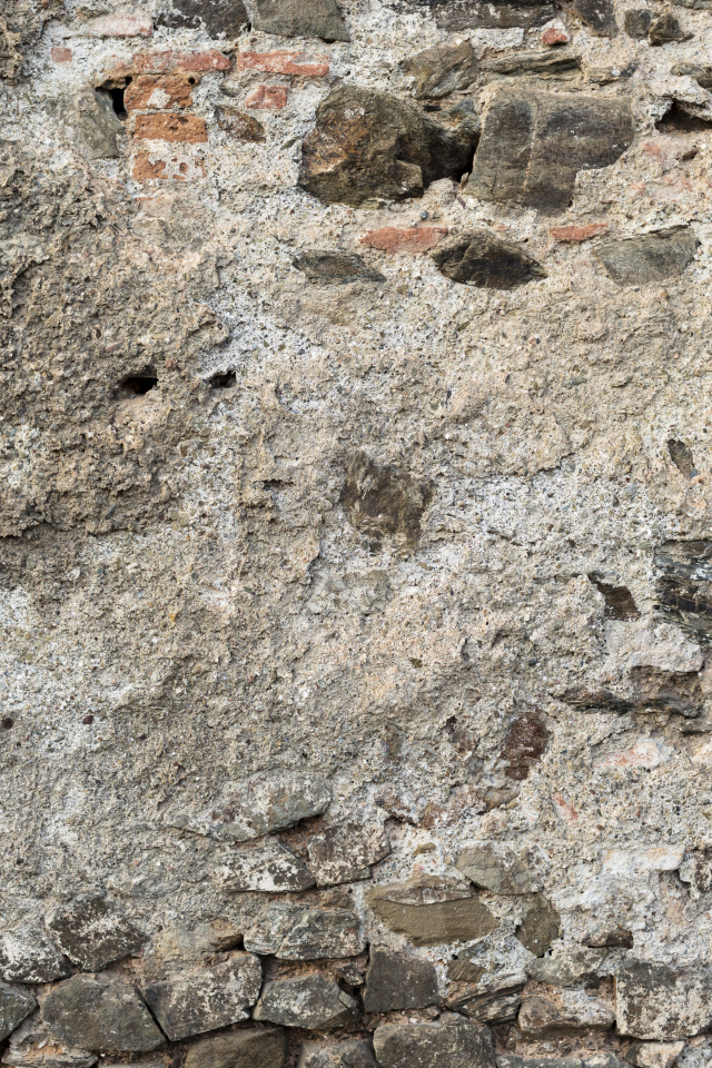 Старая текстурированная стена из цемента и кирпича для фона