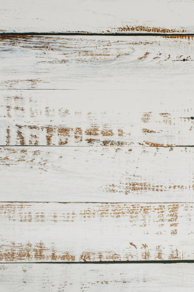 Окрашенная белой краской деревянная поверхность