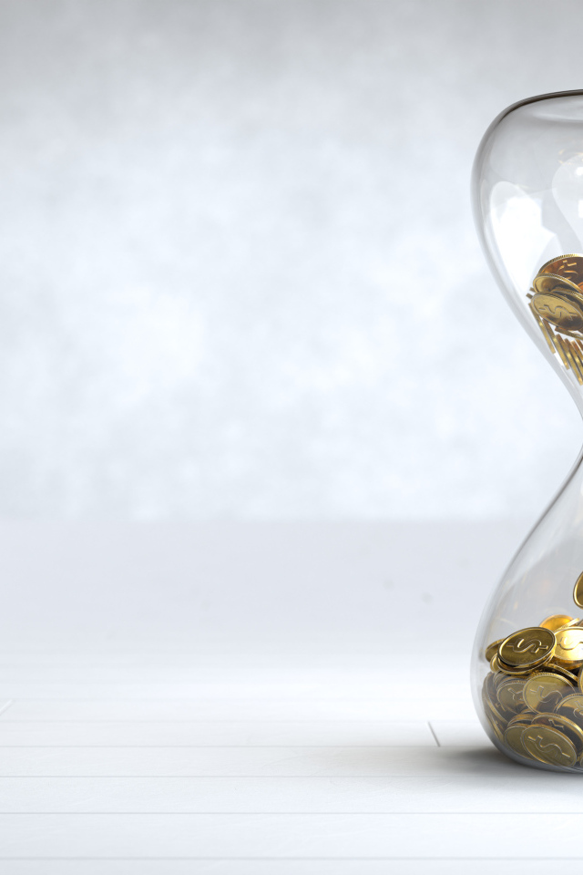 Стеклянные часы с монетами на сером фоне