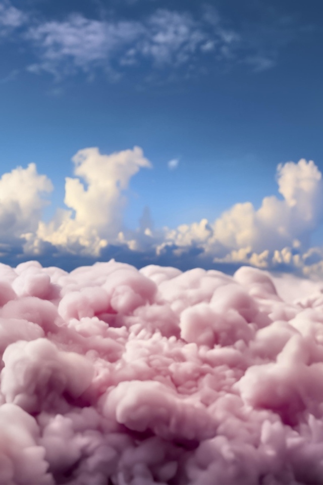 Розовый плюшевый медведь сидит на облаке