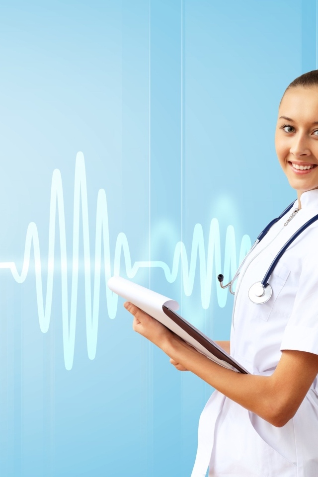 Девушка врач на фоне кардиограммы