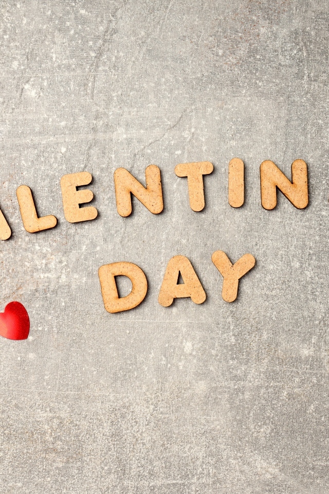 Буквы на сером фоне на день Святого Валентина