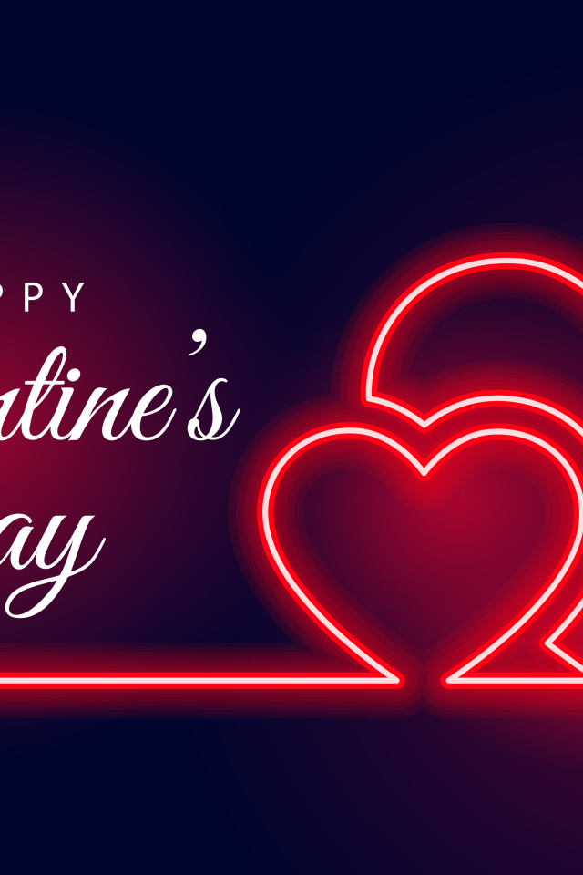 Два красных неоновых сердца на день святого Валентина