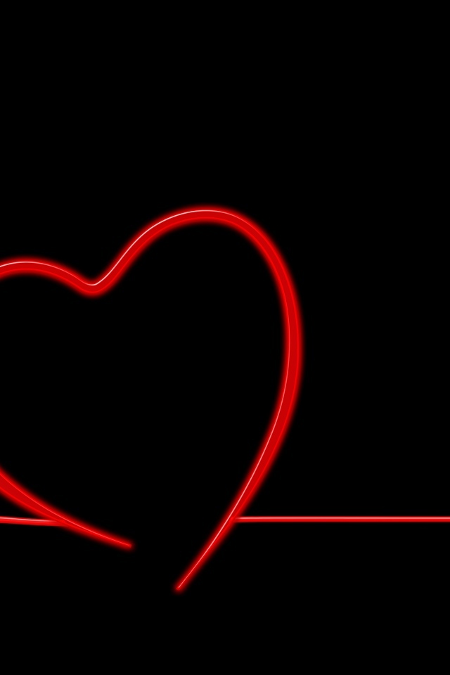 Красное сердце из провода на черном фоне