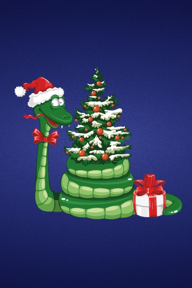 Зеленая змея с елкой на новый год 2025