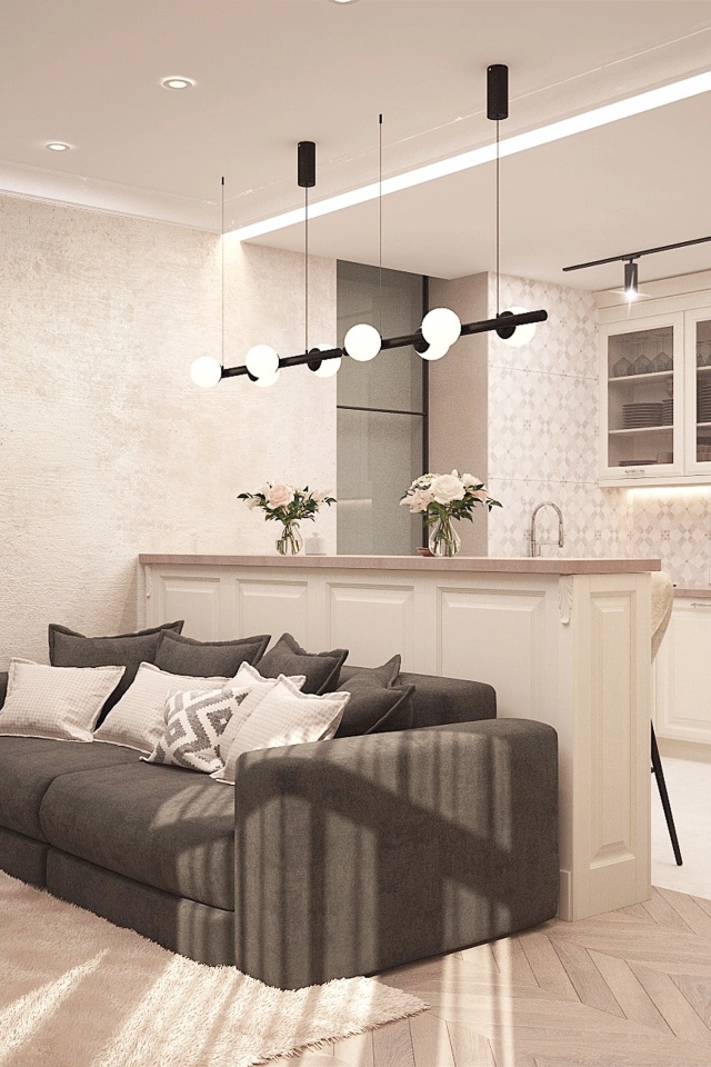 Светлая гостиная с камином и кухней