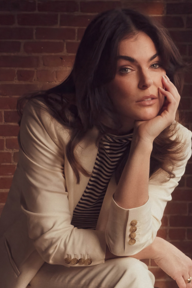 Canadian actress Serinda Swan in a white suit