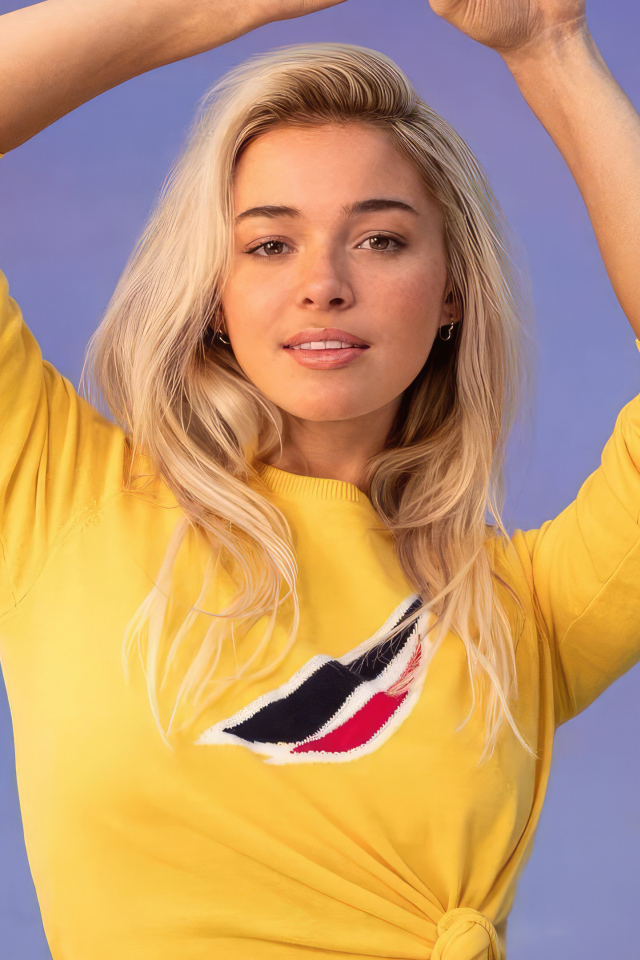 Гимнастка Ливви Данн на сиреневом фоне