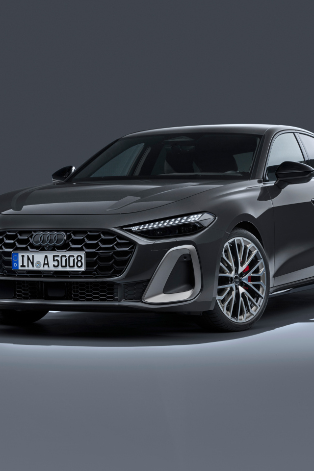 Автомобиль Audi A5 TFSI quattro S line 2024 года на сером фоне