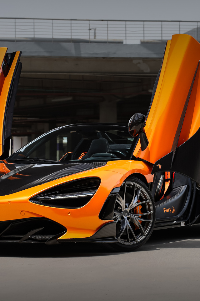 Оранжевый спорткар TopCar McLaren 720S Spider Fury с открытыми дверями