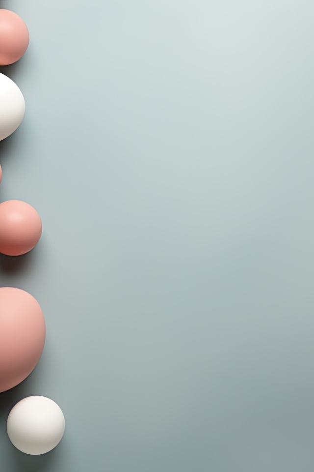 Много разноцветных яиц на сером фоне