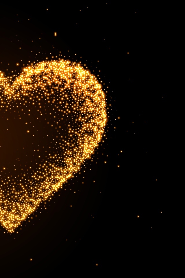 Яркое золотое сердце на черном фоне